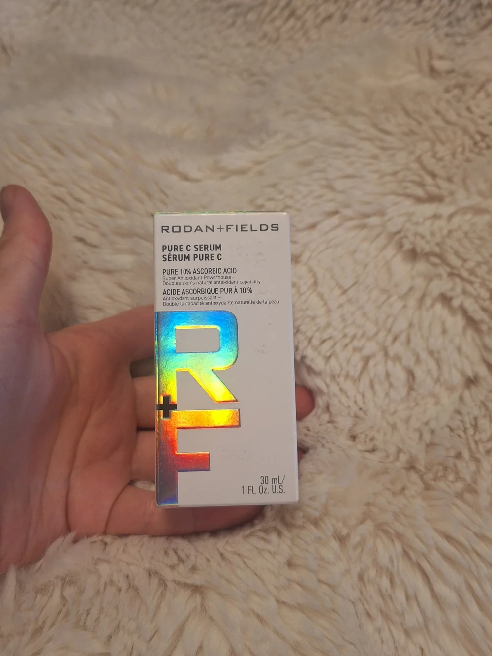 Rodan + Fields Silver Serum Bottle with Orange Band